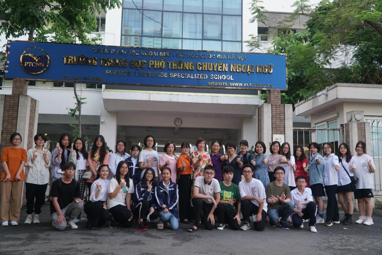 A group of people posing for a photo</p>
<p>Description automatically generated with medium confidence